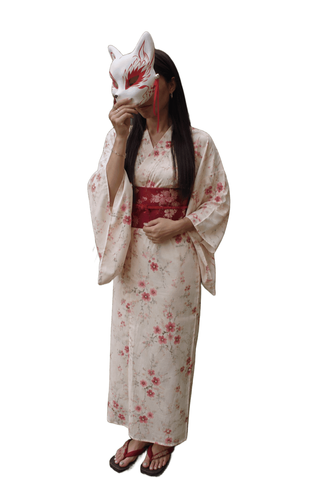 Máscara de tengu roja atada con cuerda dorada